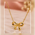 Polished Bow Pendant Necklace